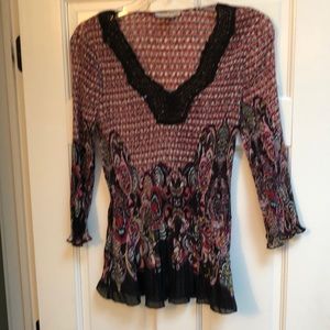 Figure flattering designer top with sequin detail